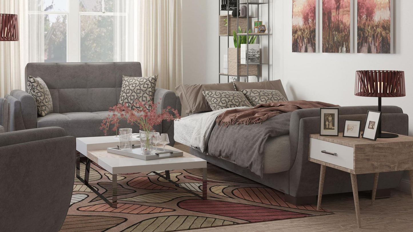 Modern design, Pewter Gray , Microfiber upholstered convertible sleeper Loveseat with underseat storage from Voyage Shelter by Ottomanson in living room lifestyle setting converted to sleeper. This Loveseat measures 71 inches width by 36 inches depth by 41 inches height.