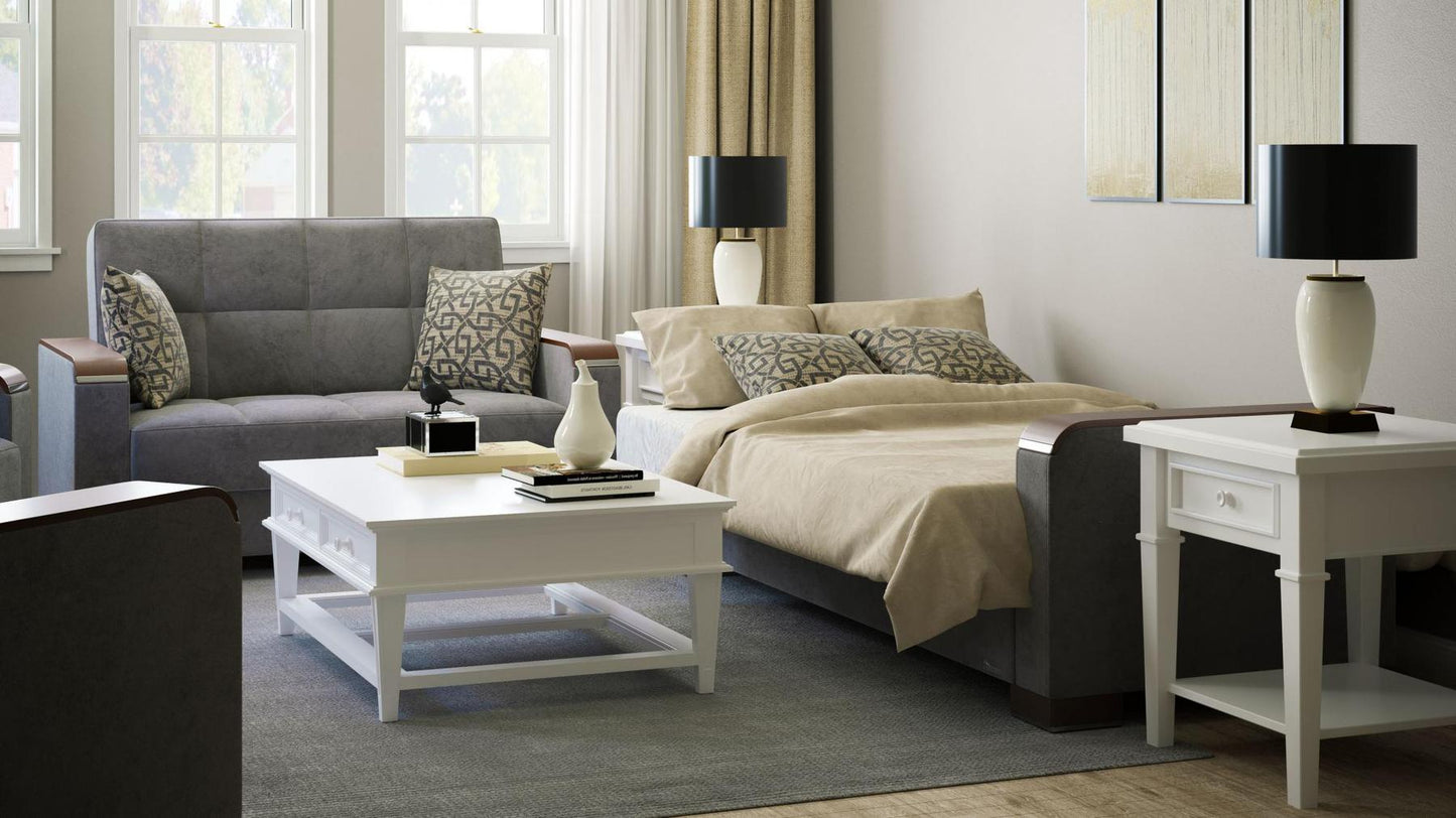 Modern design, Pewter Gray , Microfiber upholstered convertible sleeper Loveseat with underseat storage from Voyage Luxe by Ottomanson in living room lifestyle setting converted to sleeper. This Loveseat measures 67 inches width by 36 inches depth by 41 inches height.