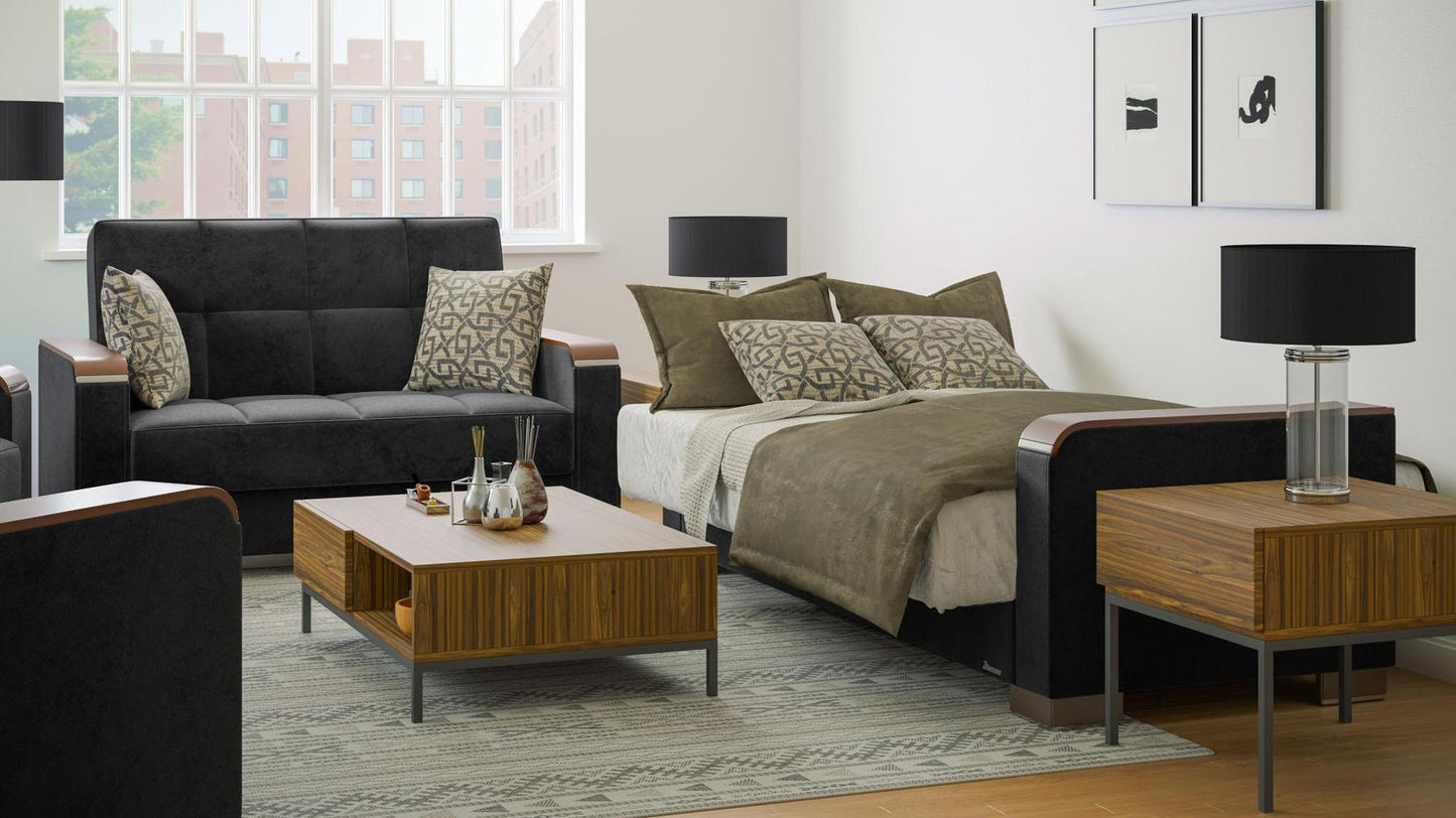 Modern design, Black , Microfiber upholstered convertible sleeper Loveseat with underseat storage from Voyage Luxe by Ottomanson in living room lifestyle setting converted to sleeper. This Loveseat measures 67 inches width by 36 inches depth by 41 inches height.