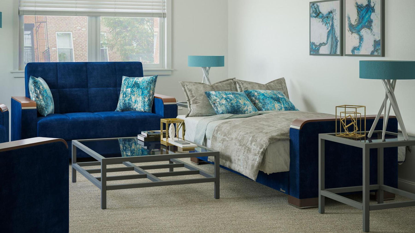 Modern design, True Blue , Microfiber upholstered convertible sleeper Loveseat with underseat storage from Voyage Luxe by Ottomanson in living room lifestyle setting converted to sleeper. This Loveseat measures 67 inches width by 36 inches depth by 41 inches height.