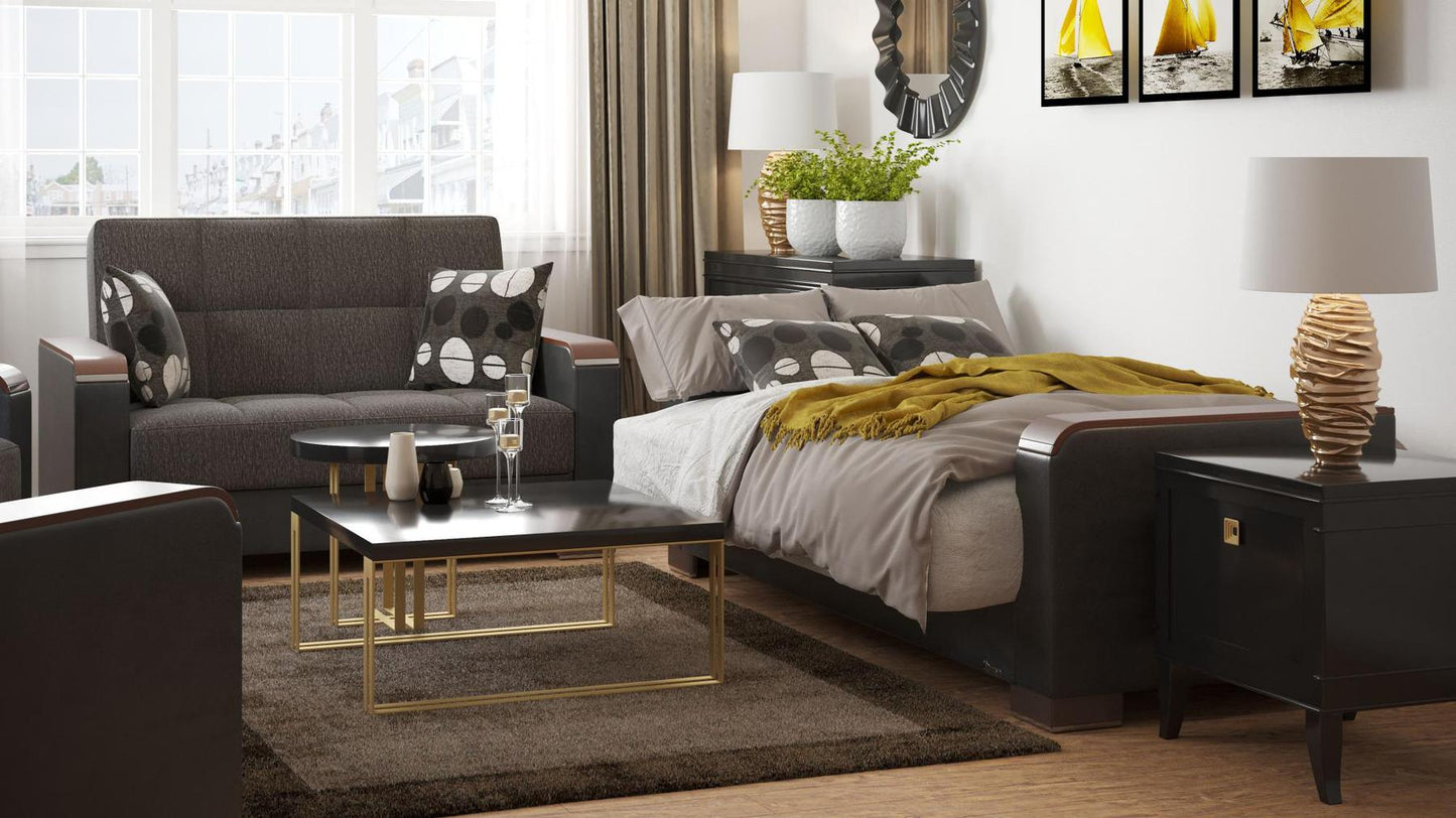 Modern design, Dark Slate Gray, Black , Chenille, Artificial Leather upholstered convertible sleeper Loveseat with underseat storage from Voyage Luxe by Ottomanson in living room lifestyle setting converted to sleeper. This Loveseat measures 67 inches width by 36 inches depth by 41 inches height.