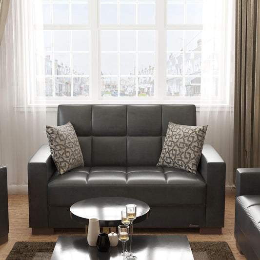 Modern design, Black , Artificial Leather upholstered convertible sleeper Loveseat with underseat storage from Voyage Track by Ottomanson in living room lifestyle setting by itself. This Loveseat measures 67 inches width by 36 inches depth by 41 inches height.