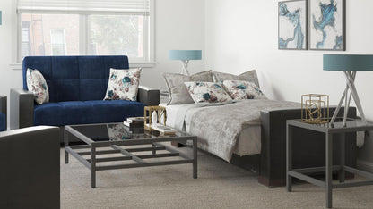 Modern design, Snorkel Blue, Black , Microfiber, Artificial Leather  upholstered convertible sleeper Loveseat with underseat storage from Voyage Track by Ottomanson in living room lifestyle setting converted to sleeper. This Loveseat measures 67 inches width by 36 inches depth by 41 inches height.
