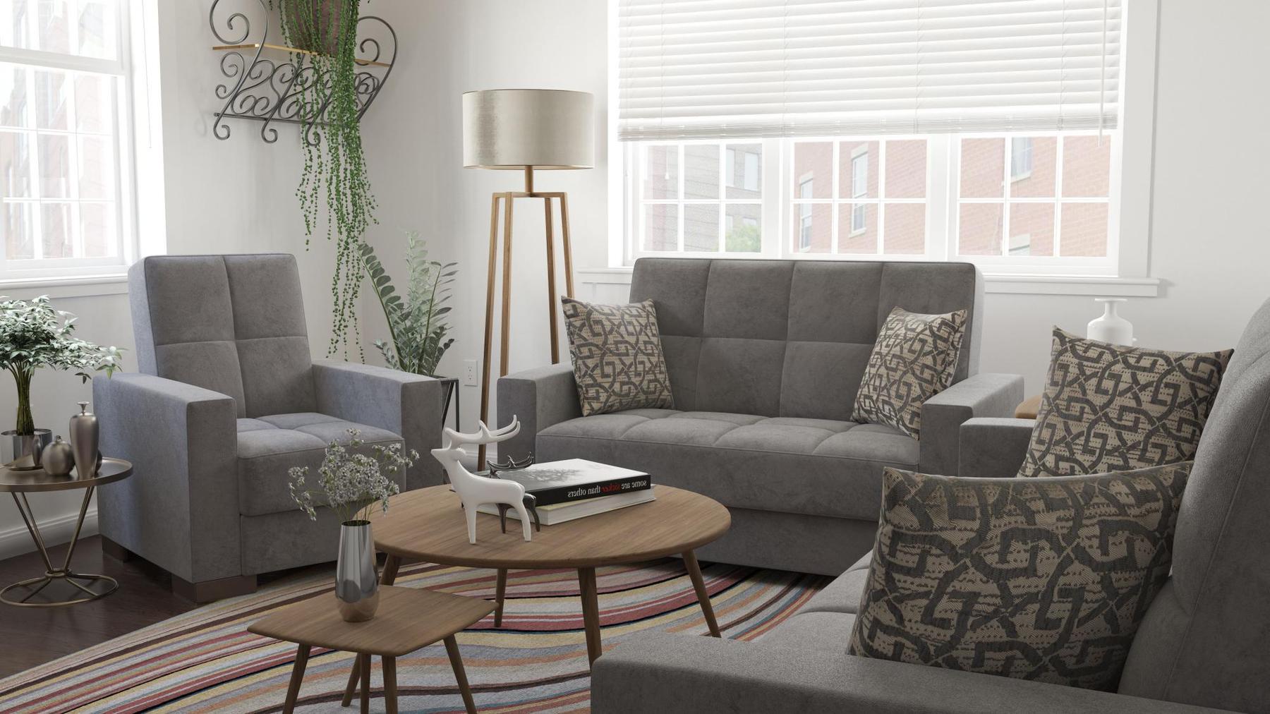 Modern design, Pewter Gray , Microfiber upholstered convertible Armchair with underseat storage from Voyage Track by Ottomanson in living room lifestyle setting with another piece of furniture. This Armchair measures 38 inches width by 36 inches depth by 41 inches height.