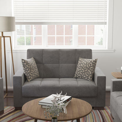 Modern design, Pewter Gray , Microfiber upholstered convertible sleeper Loveseat with underseat storage from Voyage Track by Ottomanson in living room lifestyle setting by itself. This Loveseat measures 67 inches width by 36 inches depth by 41 inches height.