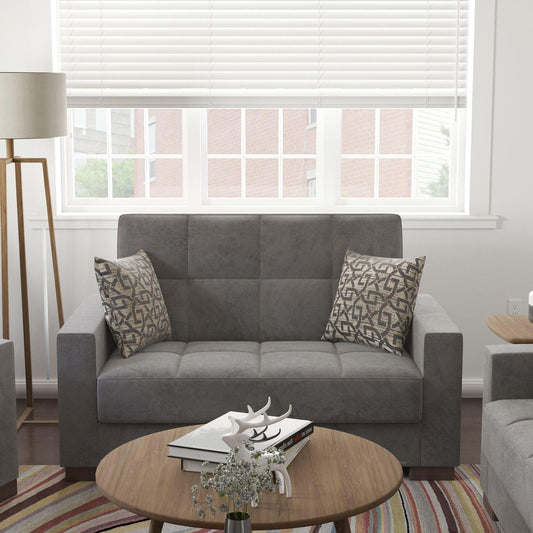 Modern design, Pewter Gray , Microfiber upholstered convertible sleeper Loveseat with underseat storage from Voyage Track by Ottomanson in living room lifestyle setting by itself. This Loveseat measures 67 inches width by 36 inches depth by 41 inches height.