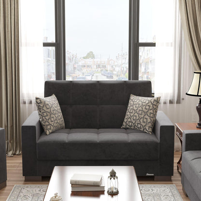 Modern design, Black , Microfiber upholstered convertible sleeper Loveseat with underseat storage from Voyage Track by Ottomanson in living room lifestyle setting by itself. This Loveseat measures 67 inches width by 36 inches depth by 41 inches height.
