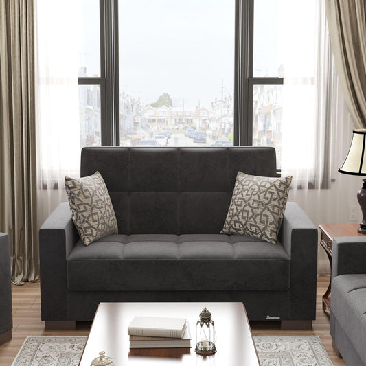 Modern design, Black , Microfiber upholstered convertible sleeper Loveseat with underseat storage from Voyage Track by Ottomanson in living room lifestyle setting by itself. This Loveseat measures 67 inches width by 36 inches depth by 41 inches height.