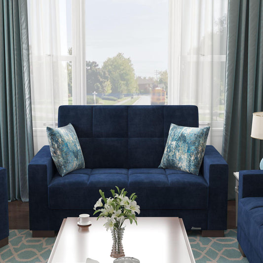 Modern design, True Blue , Microfiber upholstered convertible sleeper Loveseat with underseat storage from Voyage Track by Ottomanson in living room lifestyle setting by itself. This Loveseat measures 67 inches width by 36 inches depth by 41 inches height.