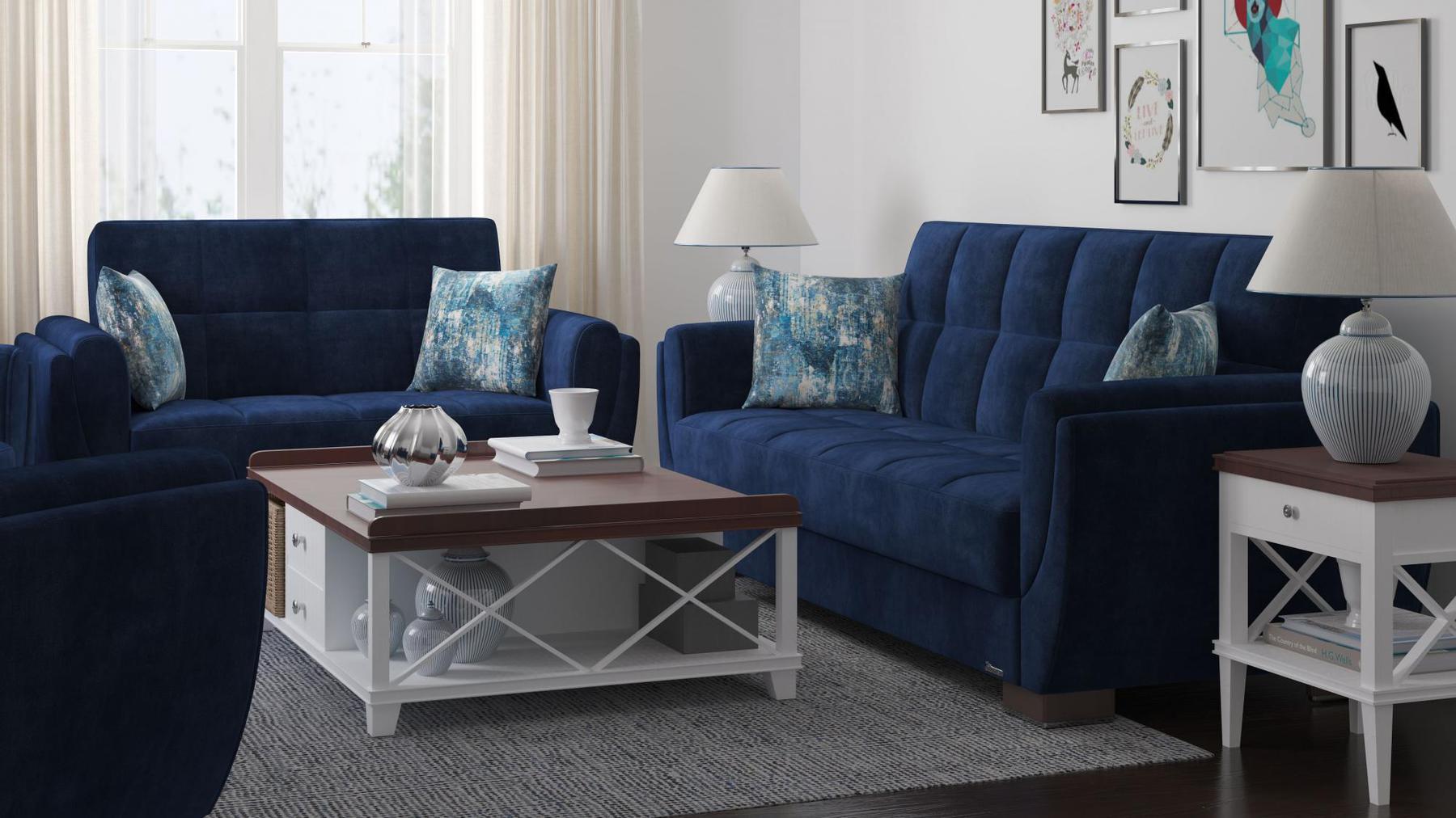 Modern design, True Blue , Microfiber upholstered convertible sleeper Loveseat with underseat storage from Voyage Shelter by Ottomanson in living room lifestyle setting with another piece of furniture. This Loveseat measures 71 inches width by 36 inches depth by 41 inches height.
