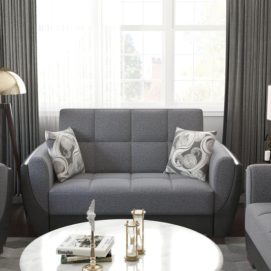 Modern design, Salt and Pepper Gray, Black , Chenille, Artificial Leather upholstered convertible sleeper Loveseat with underseat storage from Voyage Shelter by Ottomanson in living room lifestyle setting by itself. This Loveseat measures 71 inches width by 36 inches depth by 41 inches height.