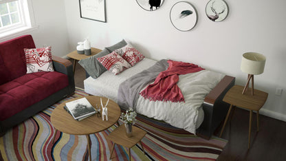Modern design, Beaujolais, Black , Microfiber, Artificial Leather  upholstered convertible sleeper Sofabed with underseat storage from Voyage Luxe by Ottomanson in living room lifestyle setting converted to sleeper. This Sofabed measures 90 inches width by 36 inches depth by 41 inches height.
