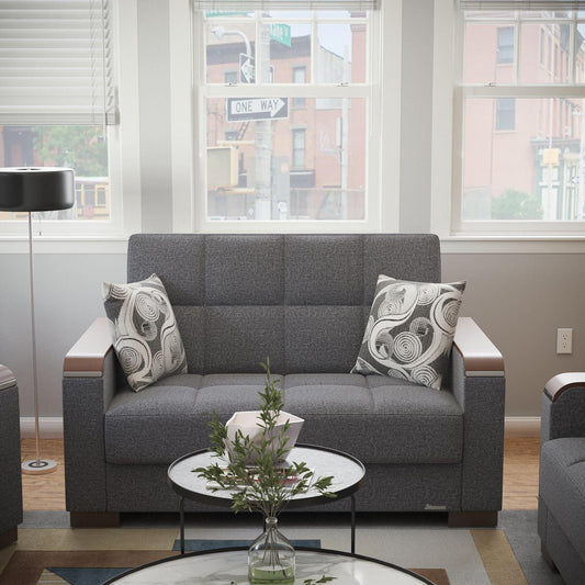 Modern design, Salt and Pepper Gray , Chenille upholstered convertible sleeper Loveseat with underseat storage from Voyage Luxe by Ottomanson in living room lifestyle setting by itself. This Loveseat measures 67 inches width by 36 inches depth by 41 inches height.