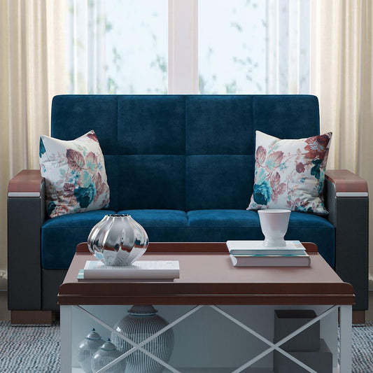 Modern design, Snorkel Blue, Black , Microfiber, Artificial Leather upholstered convertible sleeper Loveseat with underseat storage from Voyage Luxe by Ottomanson in living room lifestyle setting by itself. This Loveseat measures 67 inches width by 36 inches depth by 41 inches height.